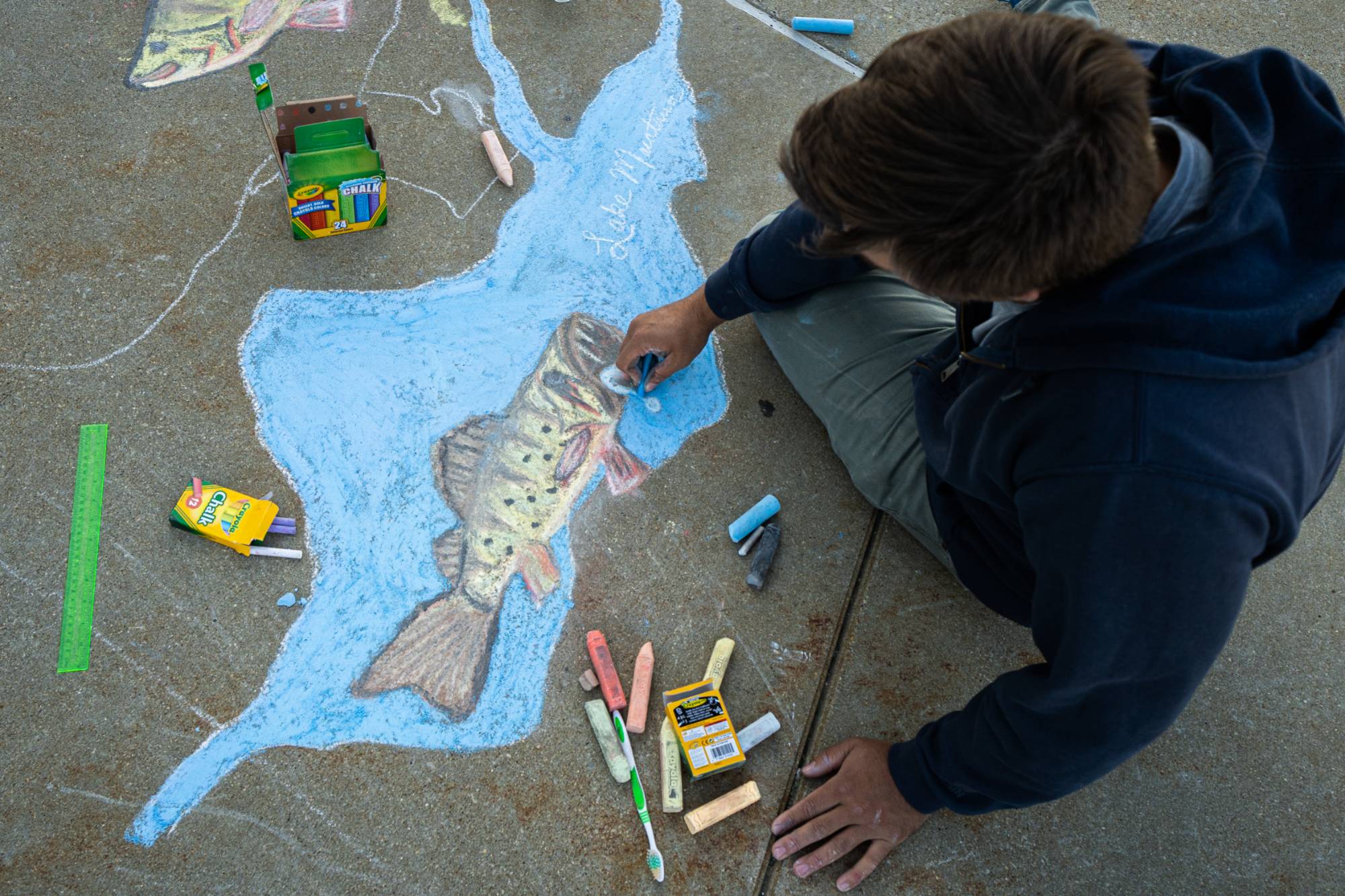 Jacob Yingling creating chalk art